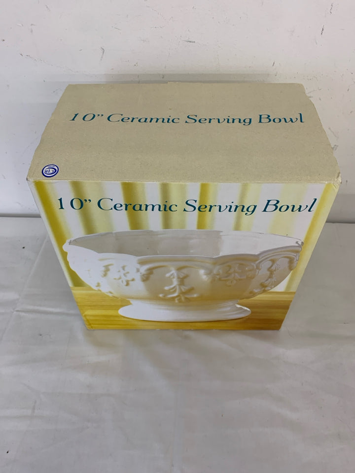 NIB CERAMIC SERVING BOWL WHITE W/ EMBOSSED SCROLL DESIGN.