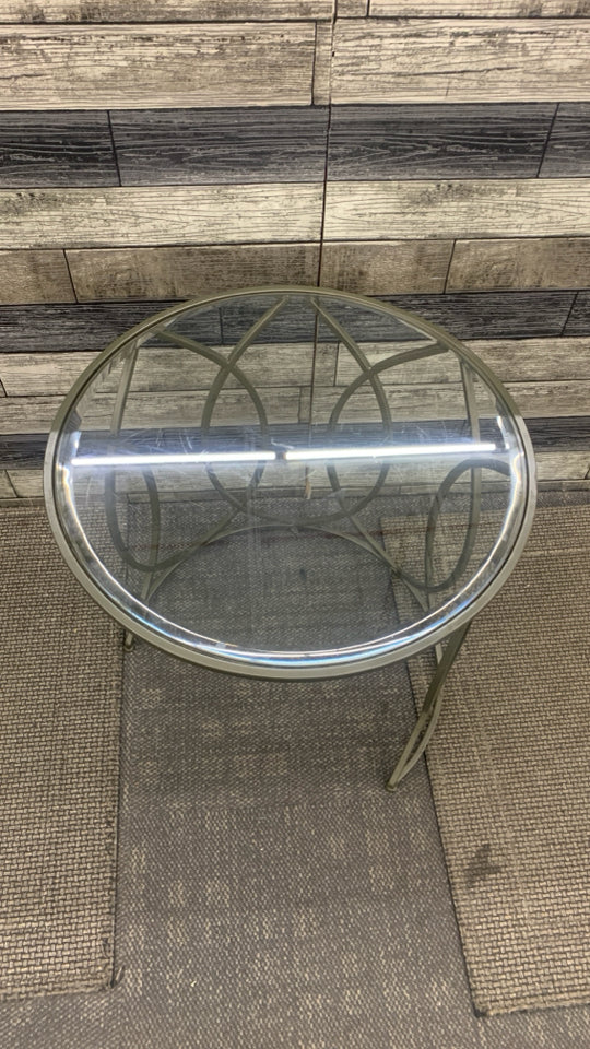 2PC ROUND GLASS STACKING TABLES W/METAL LEGS.