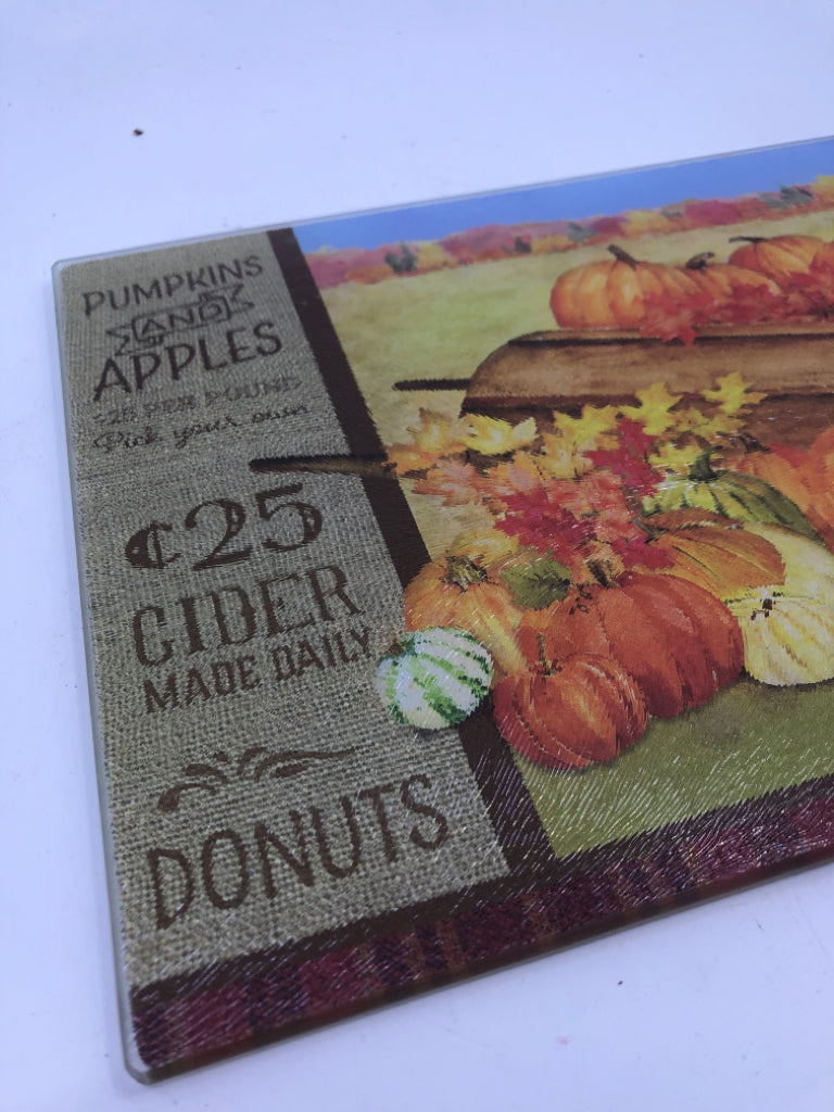 GLASS PUMPKIN CUTTING BOARD.