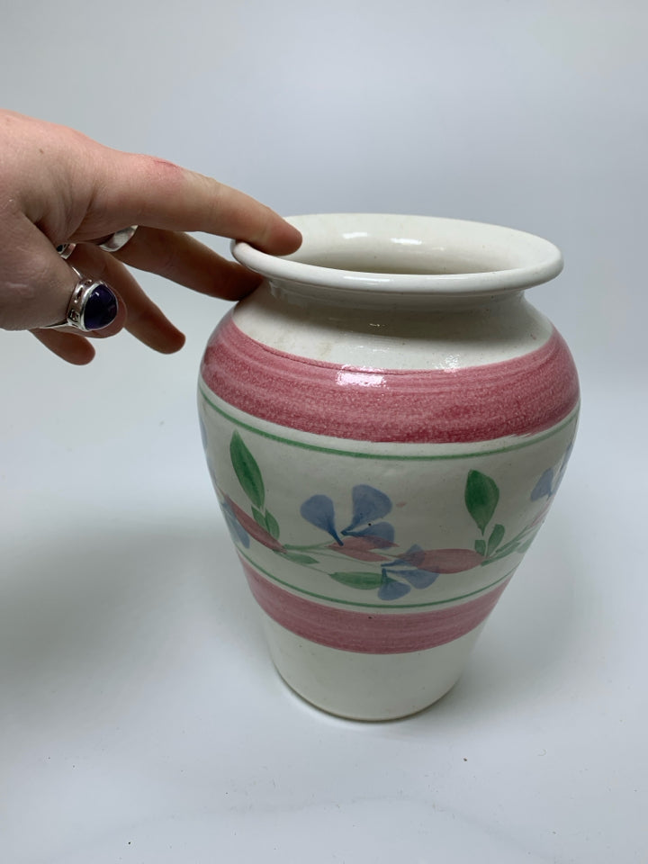 WHITE POTTERY VASE W/ PINK BANDS & FLOWERS.