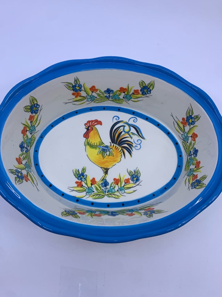 OVAL ROOSTER DISH W BLACK STAND.