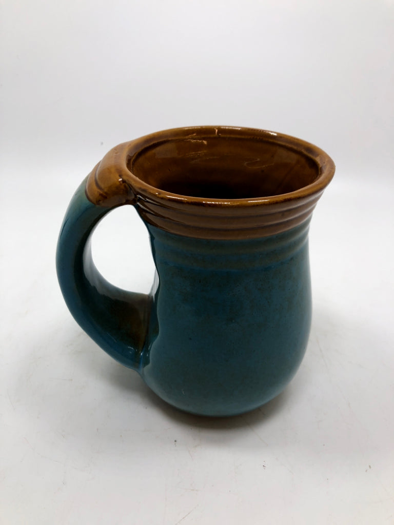 TEAL GLAZED COFFE MUG W/TURTLE.