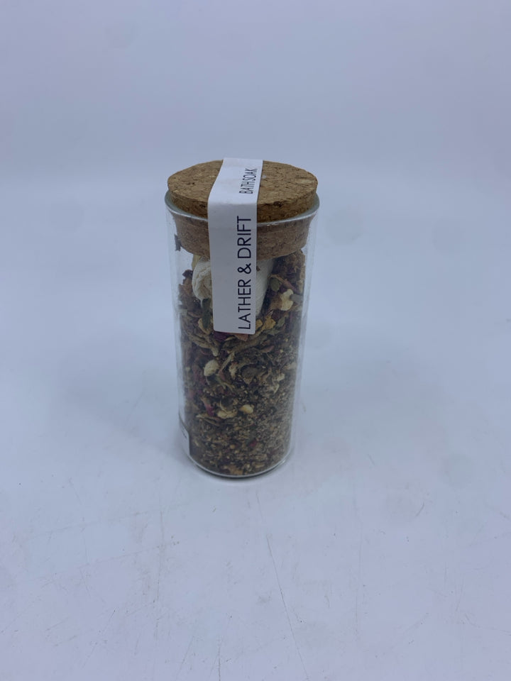 NIP LATHER AND DRIFT BATH SOAK.