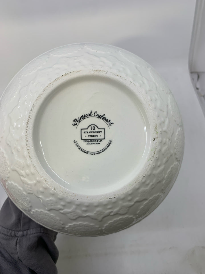 WHITE ORNAMENT SHAPED W/ RED BARN MERRY & BRIGHT.