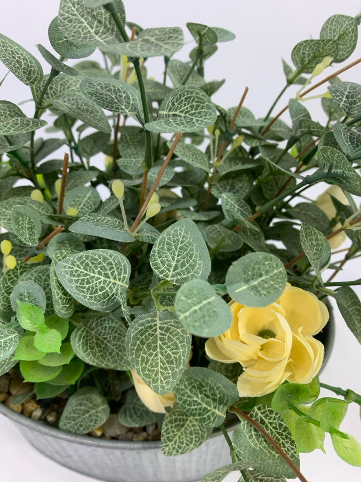 FAUX LEAVES & CREAM FLOWERS IN GALVANIZED TIN.