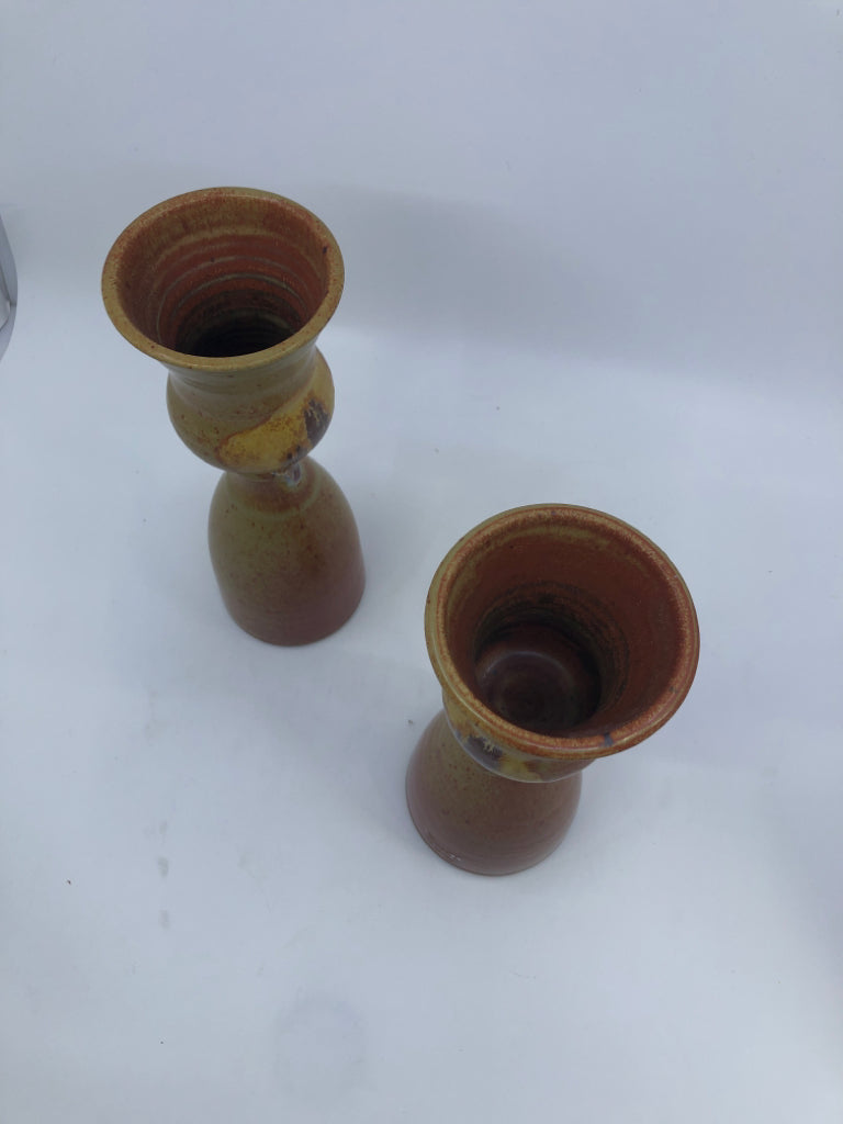 2 POTTERY CANDLE HOLDERS- SIGNED.