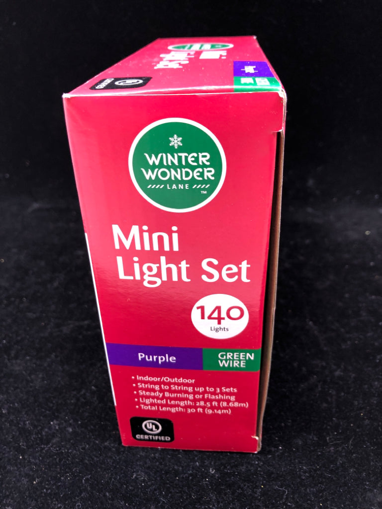 NIB PURPLE MINI LIGHT SET.