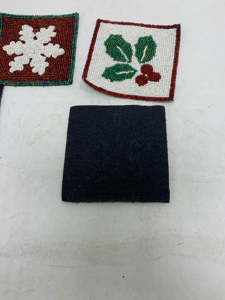 4 BEADED SNOWFLAKES/HOLLY COASTERS.