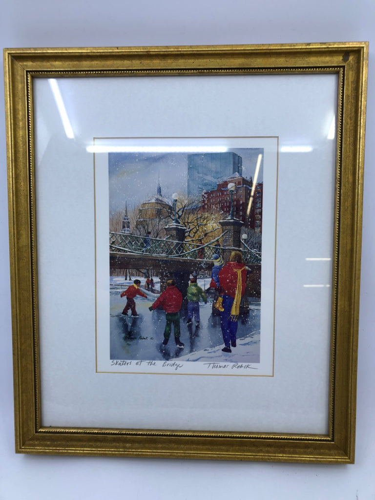 SKATERS AT THE BRIDGE IN GOLD FRAME WALL DECOR.