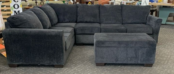 BLUE PLUSH SECTIONAL AND OTTOMAN W/ STORAGE.