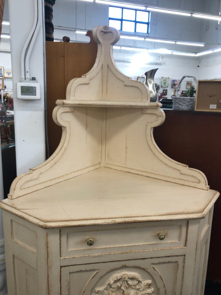 DISTRESSED CREAM CORNER HUTCH W DRAWER AND CABINET.