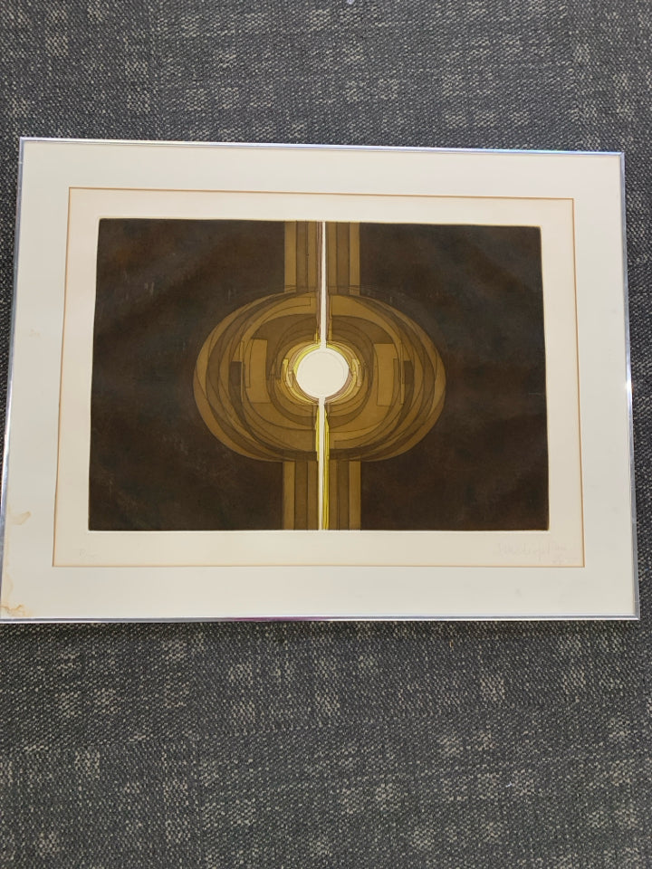ABSTRACT CIRCLE WALL ART- SIGNED IN SILVER FRAME.