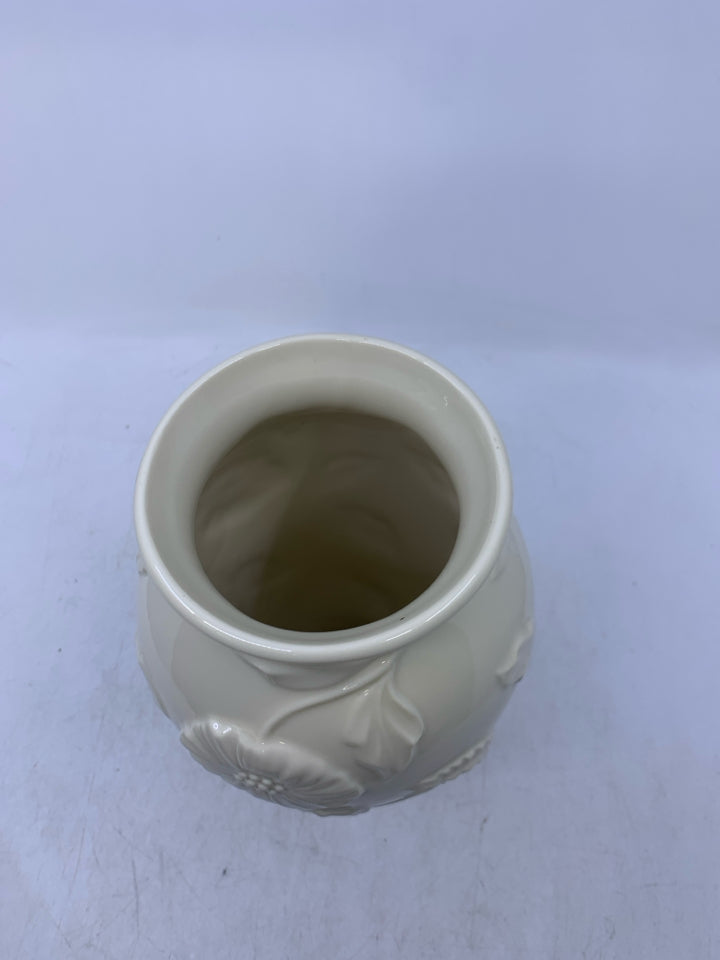 LARGE VASE W/ EMBOSSED FLOWERS.