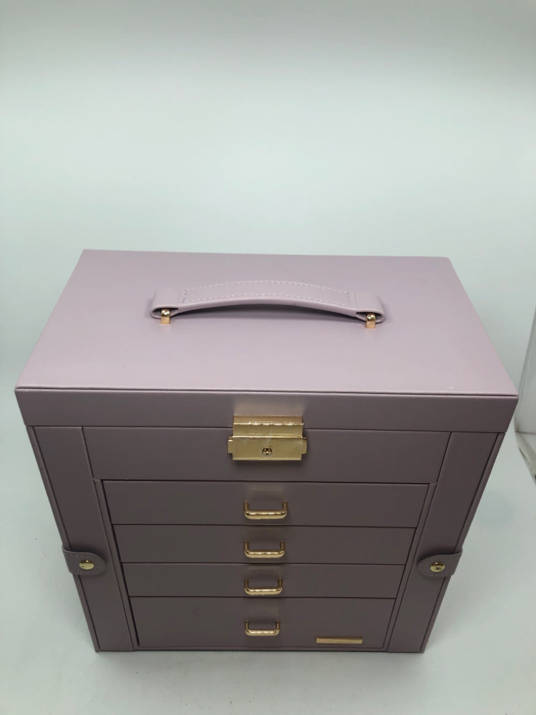4 DRAWER PURPLE FAUX LEATHER JEWELRY ORGANIZER W/FLIP TOP.
