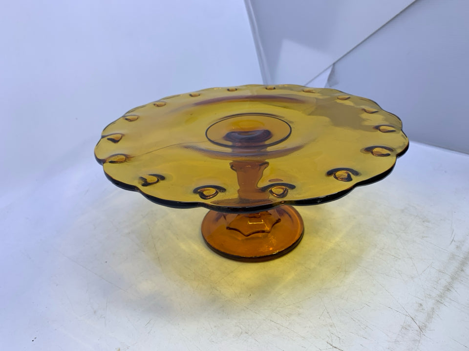 VTG AMBER GLASS CAKE STAND.