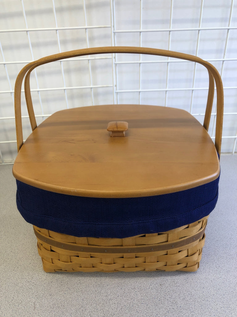 2003 NAVY LINED SQUARE BASKET W/HANDLES AND LID, RISER PLASTIC LINER.