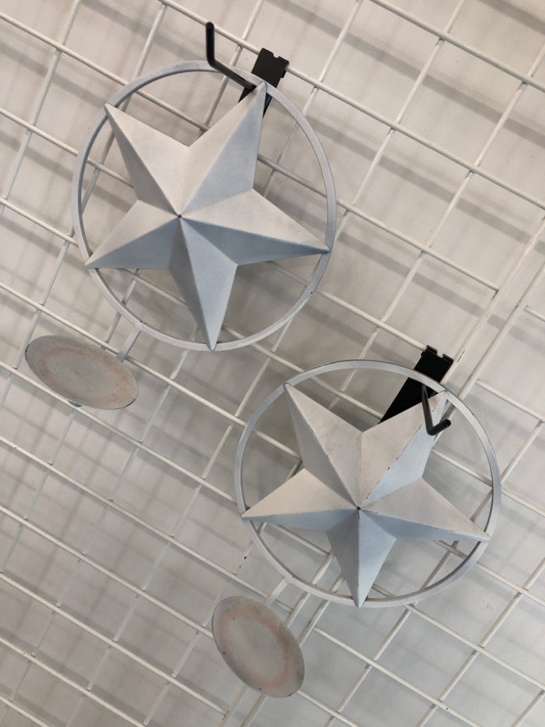 2 WHITE STAR METAL CANDLE HOLDER.