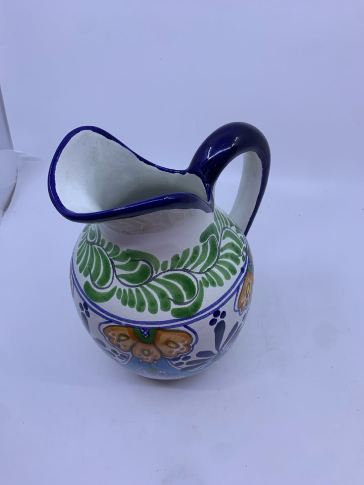 BLUE AND MEXICAN POTTERY PITCHER.