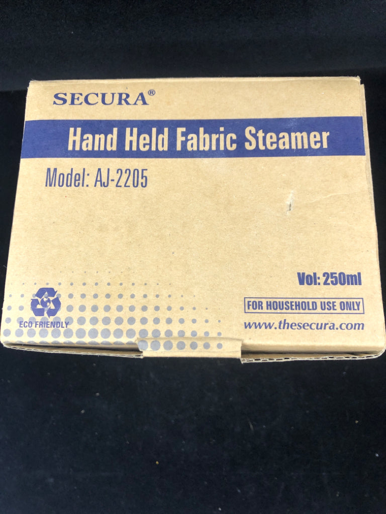 NIB HAND HELD FABRIC STEAMER SECURA.