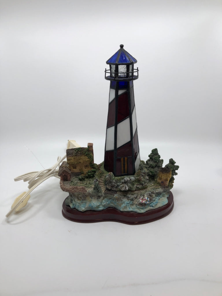 STAINED GLASS LIGHT HOUSE LAMP W/RESIN BASE.