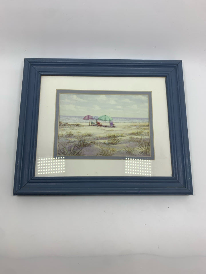 BEACH CHAIRS AT OCEAN PRINT IN BLUE FRAME.