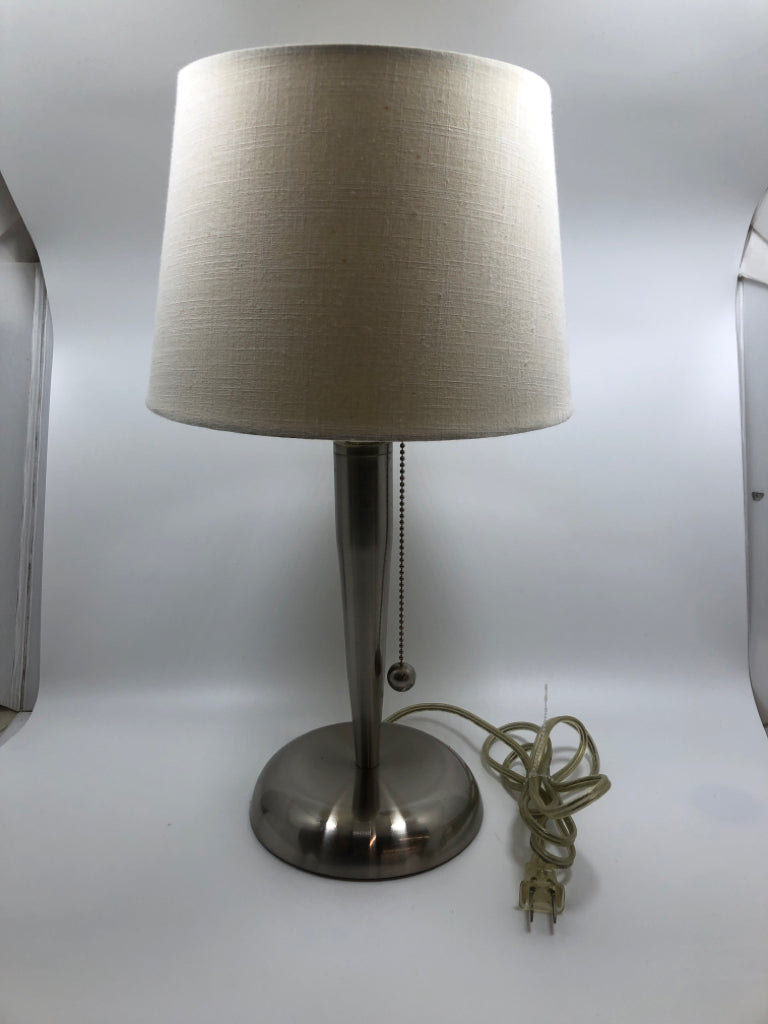 SILVER LAMP W/ ROUND CREAM SHADE.