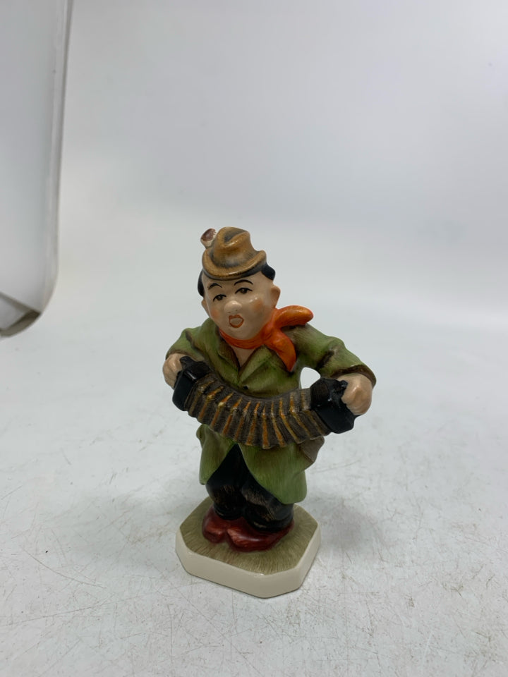 VTG FRIEDEL GERMAN GREEN COAT MAN PLAYING ACCORDION FIGURINE.