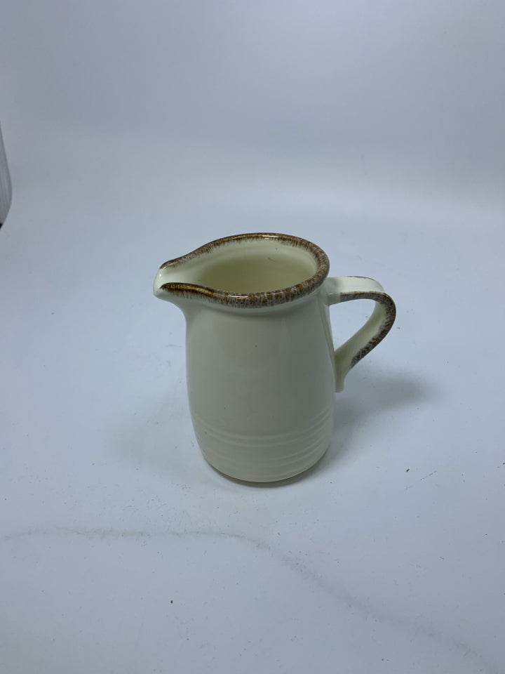 VTG RIBBED CREAMER W/ BROWN EDGE.