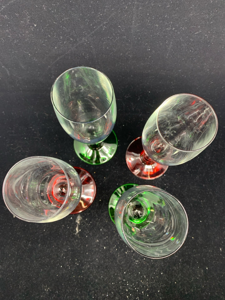 4 GLASSES W/ GREEN & RED STEMS.