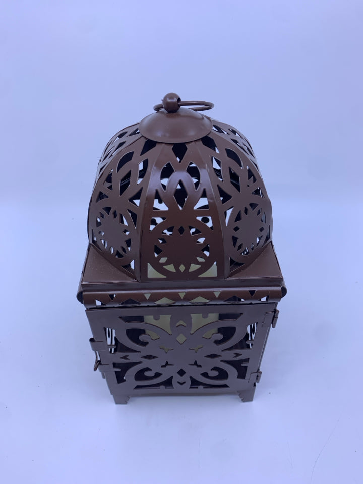 BROWN PIERCED LANTERN W/ BATTERY CANDLE .