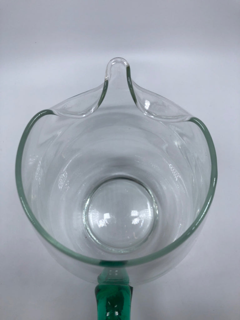 CLEAR GLASS PITCHER W/GREEN GLASS HANDLE.