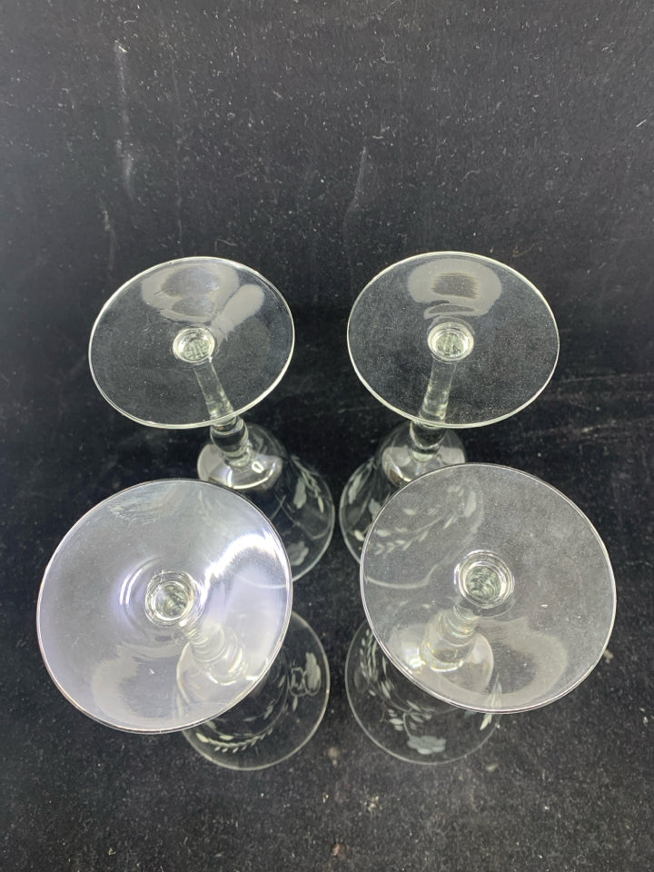 4 FLORAL ETCHED WINE GLASSES.