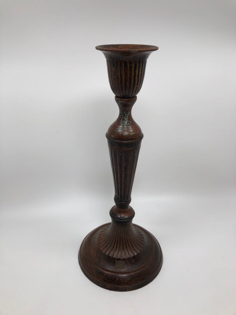 BROWN METAL PILLAR CANDLE HOLDER.