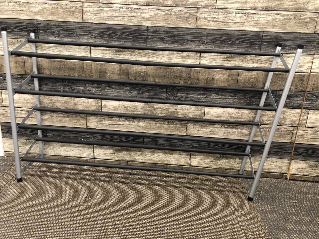 METAL SHOE RACK W/EXPANDABLE POLES.