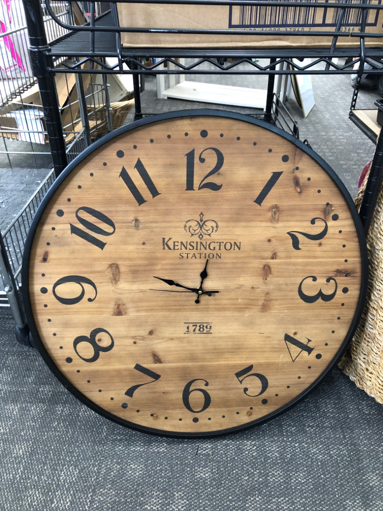 RUSTIC WOODEN CLOCK W/BLACK RIM.