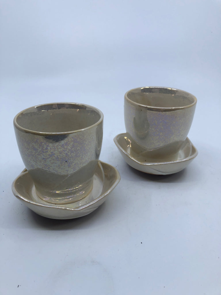 2 IRIDESCENT TEA CUPS/SAUCERS.