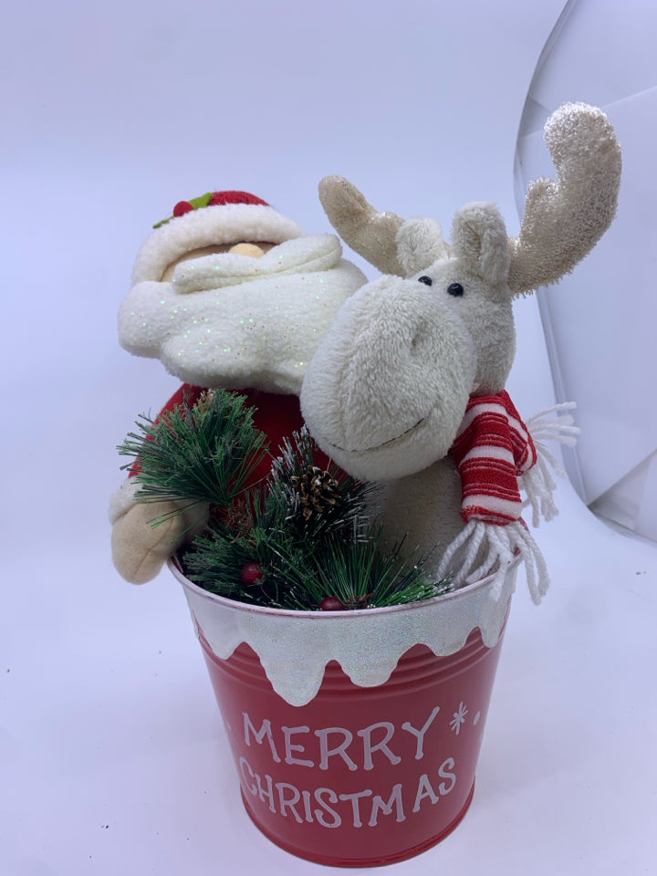 PLUSH SANTA & REINDEER IN RED BUCKET.