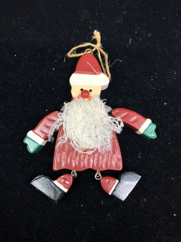 WOOD SANTA ORNAMENT W/ MOVING ARMS/LEGS.