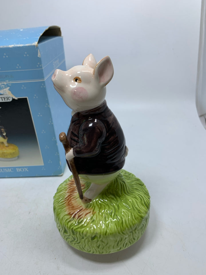 VTG IN BOX PIGLING BLAND CERAMIC MUSIC BOX PIG DRESSED IN SUIT.