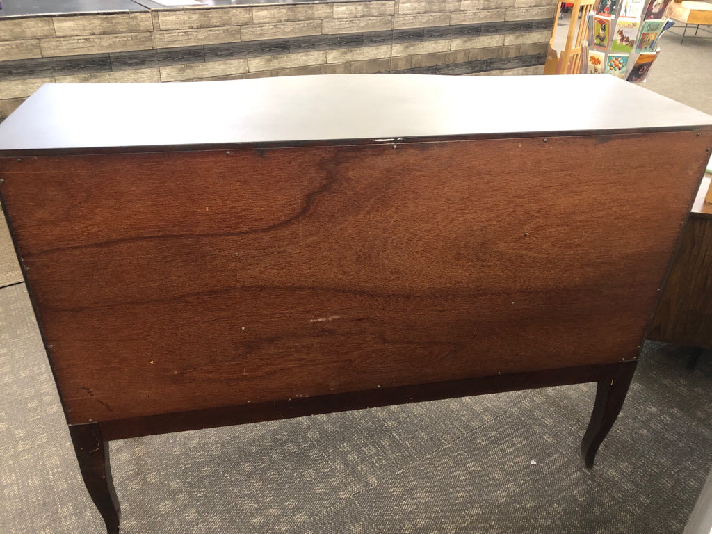 BLACK MID-CENTURY MODERN SIDEBOARD W/GOLD HARDWARE.