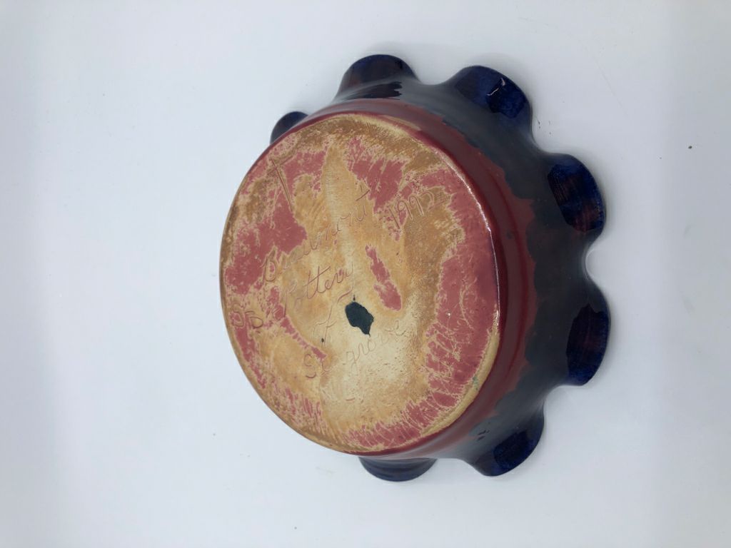 BLUE AND PINK WAVY EDGE POTTERY PIE DISH.