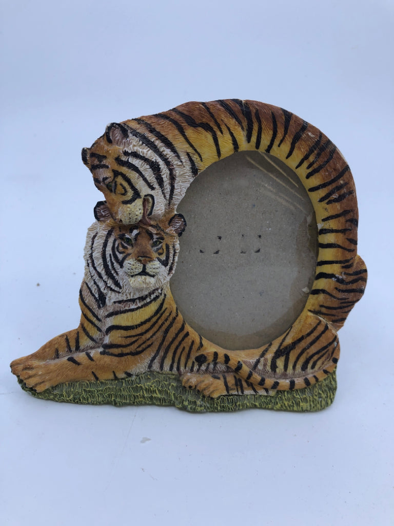 OVAL RESIN TIGER FRAME.