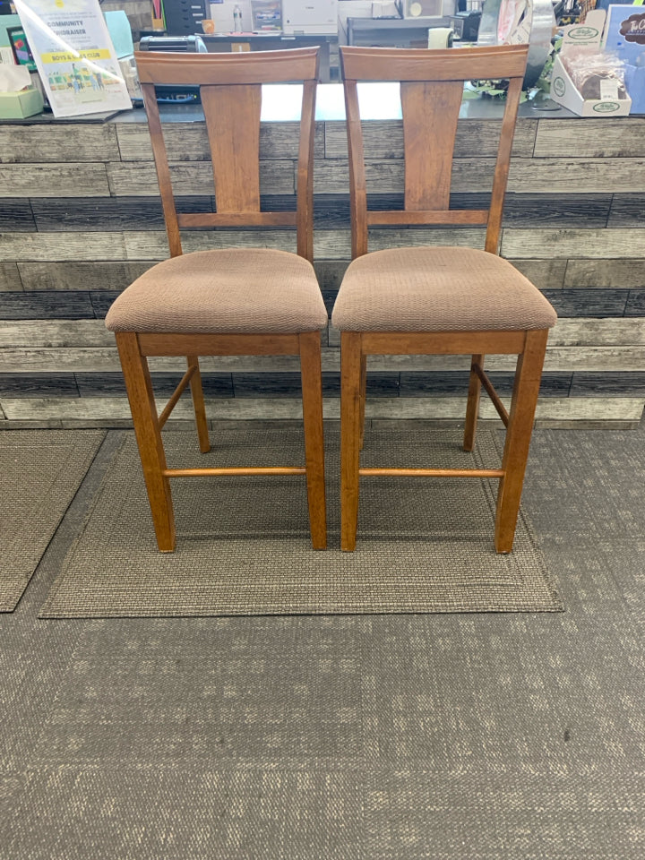 2 BROWN WOOD STOOLS.