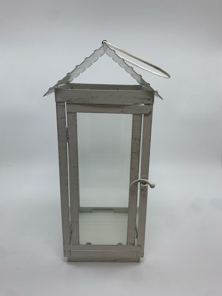 WHITE METAL CANDLE LANTERN.