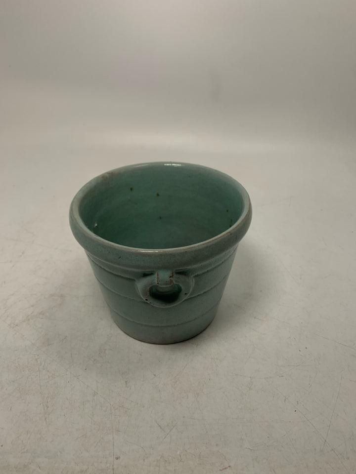 SMALL TERRA COTTA PLANTER.