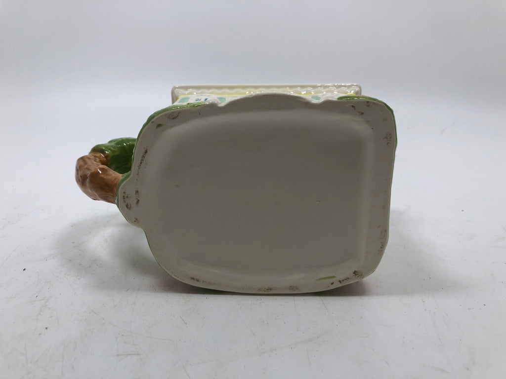 YELLOW COTTAGE W/PLANTS CREAMER.