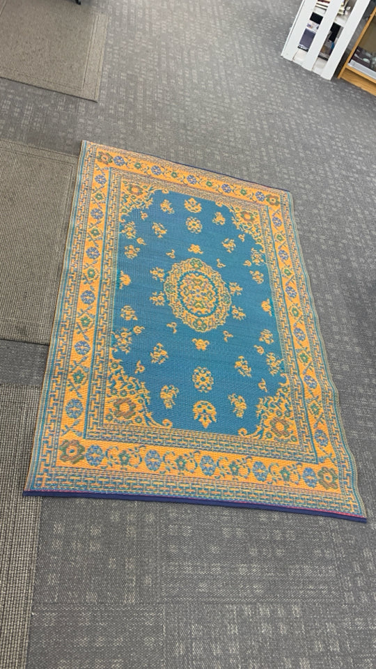BLUE/ORANGE MAD MATS REVERSIBLE INDOOR OUTDOOR RUG.
