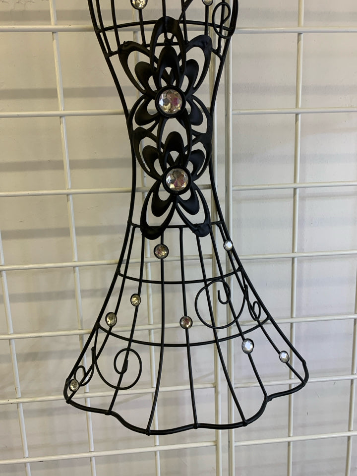 BLACK METAL FORM WHITE CRYSTALS DRESS ON HANGER.
