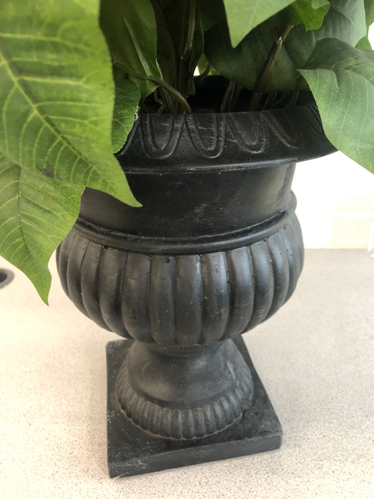 FAUX POINSETTIA IN HEAVY CERAMIC PLANTER.