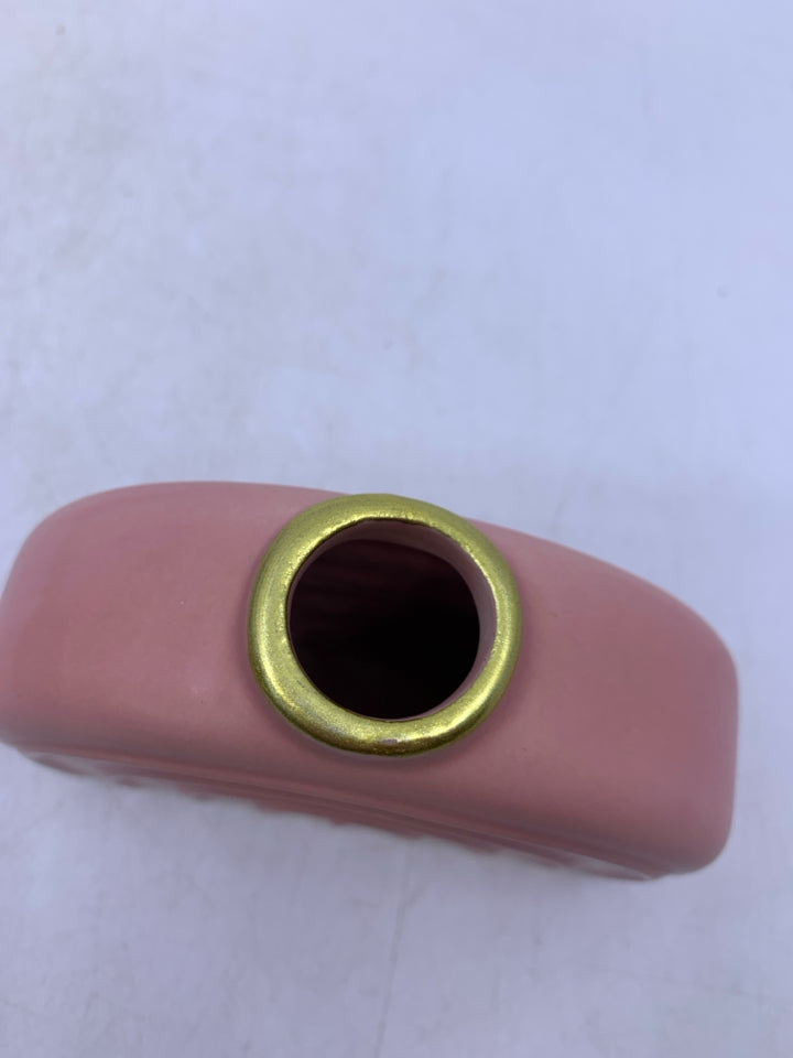 PINK CERAMIC RAINBOW SHAPED VASE.